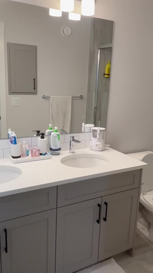 Bathroom vanity after cleaning by Noble Touch